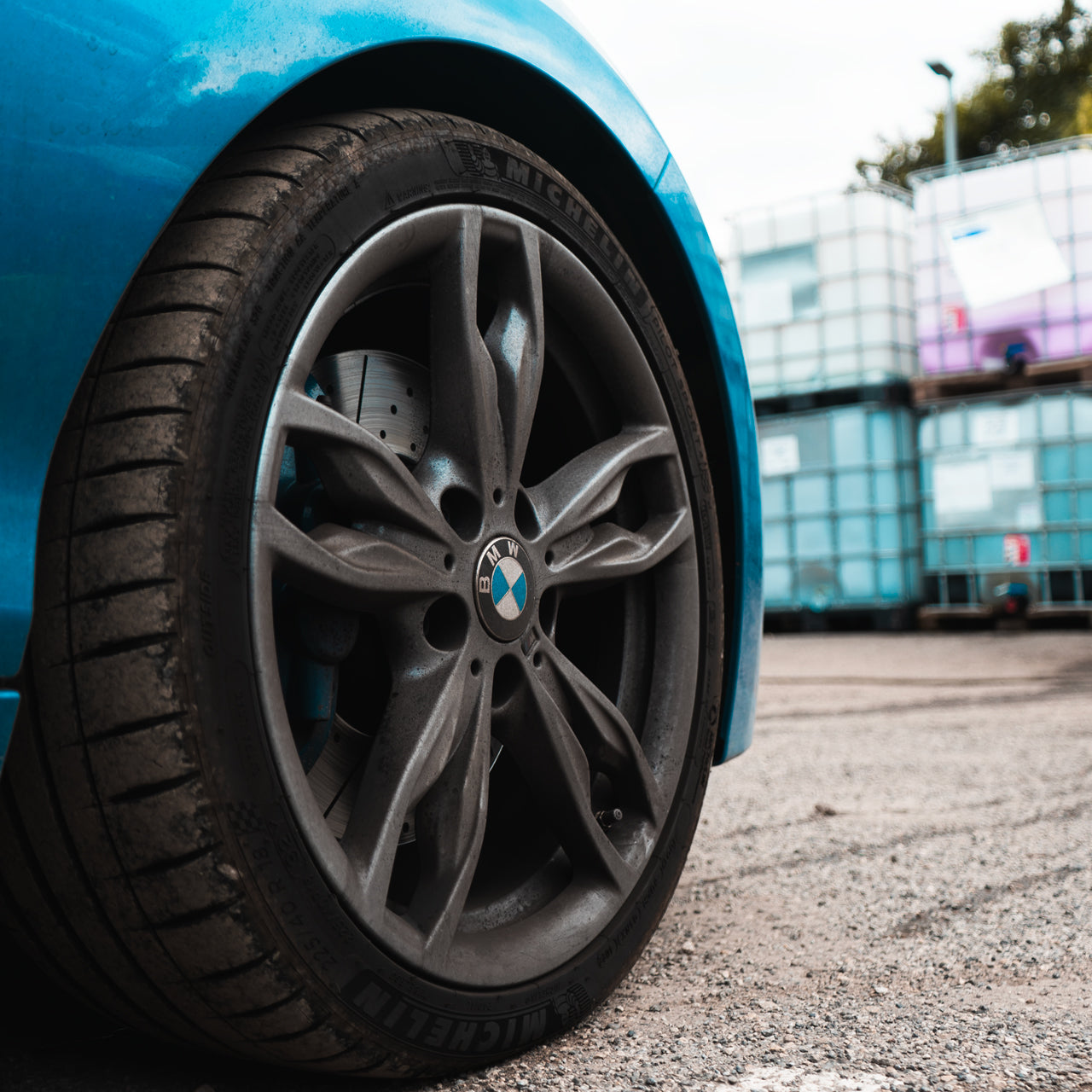 dirty bmw m135i wheels covered in grime and brake dust